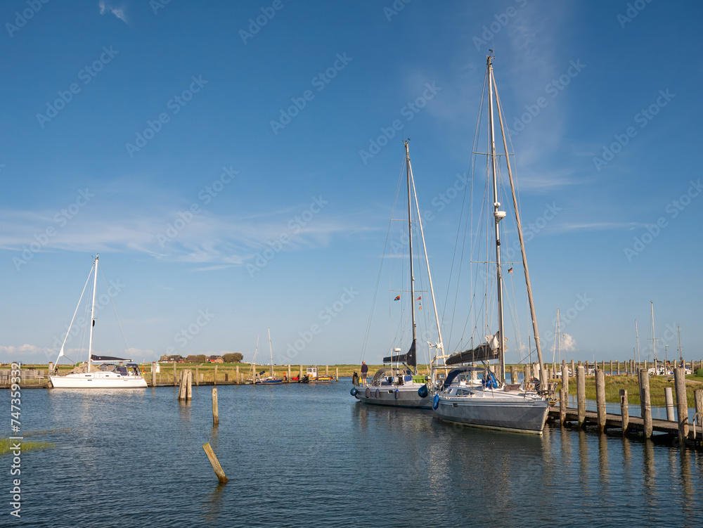 Sailboats in marina of Hooge hallig, North Frisia, Schleswig-Holstein, Germany