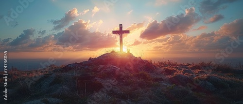 Calvary And Resurrection Concept - Cross With Robe And Crown Of Thorns On Hill At Sunset photo