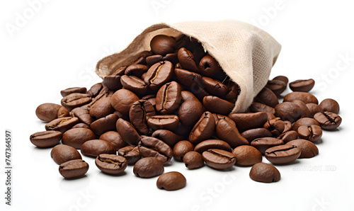 pile of coffee beans spilling from bag on white background