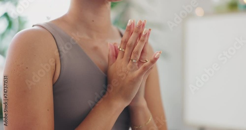 Meditation, woman and namaste hands in home for health, wellness and care in living room. Calm, relax and peace of a female person in a lounge with spiritual practice in a house for zen in morning photo