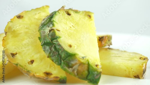 Ripe, juicy, yellow pineapple slices