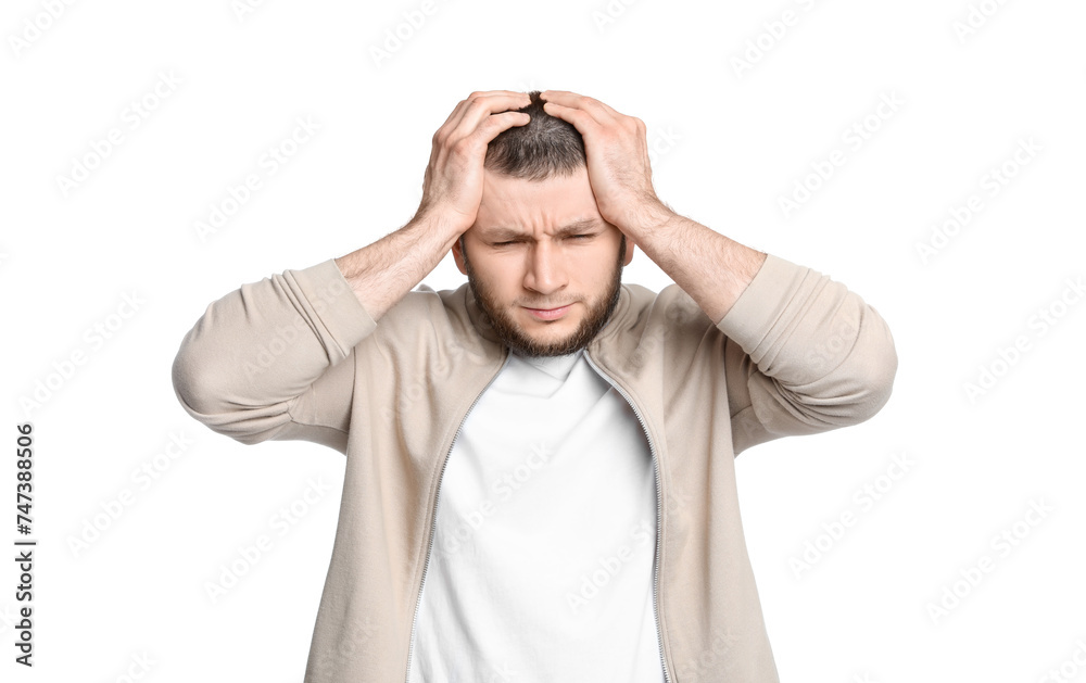 Man suffering from headache on white background