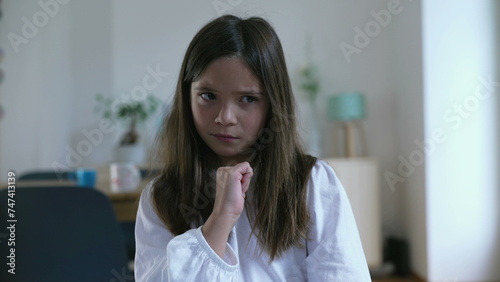 Little Girl Pointing at Herself in surprise and Disbelief, Then Shaking Finger in Rejection saying NOT ME
