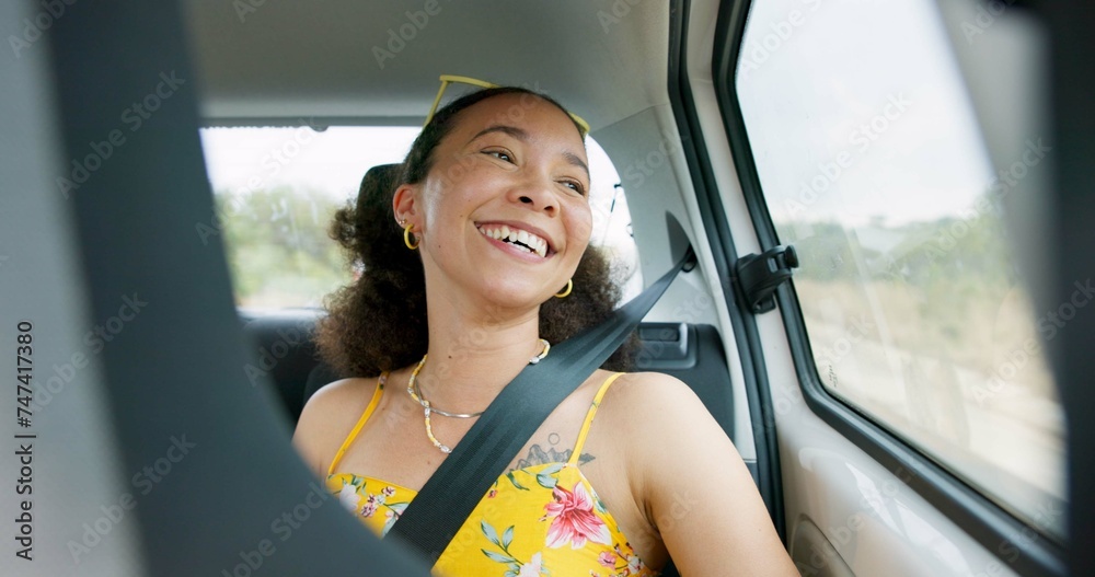 © CineLens/peopleimages.com - Woman, car and road trip with laugh by window with thinking, ideas and comic memory for vacation travel. Girl, person and happy in vehicle with smile to remember funny story with driving on road