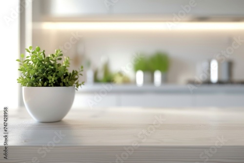 A potted plant sitting on a wooden table. Ideal for home decor or gardening concepts