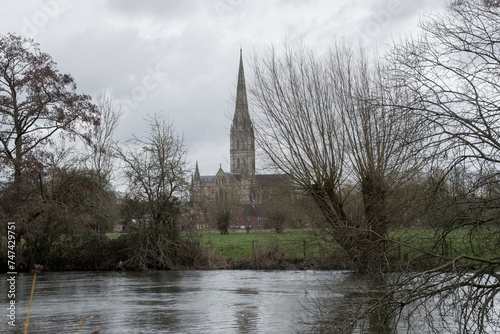 view of Salisbury cathedral Britain   s tallest spire across the River Avon Wiltshire England