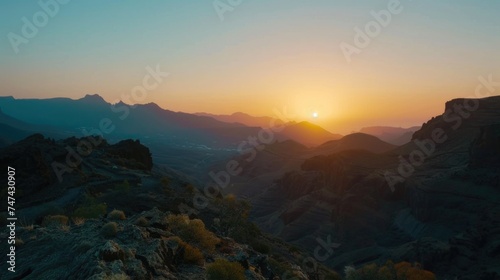 Beautiful sunset scene over distant mountains, perfect for nature backgrounds