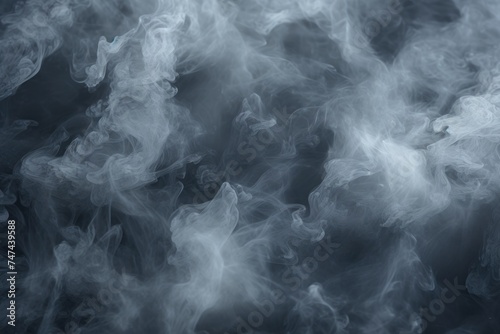Close up view of smoke on a black background. Perfect for adding a mysterious and dramatic touch to your design projects