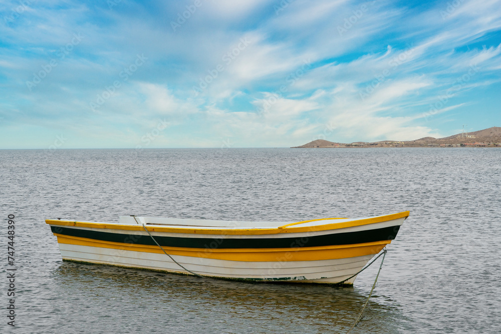 boat in the sea and landscape with blue sky on the beach. Cabo de la Vela, Guajira, Colombia.