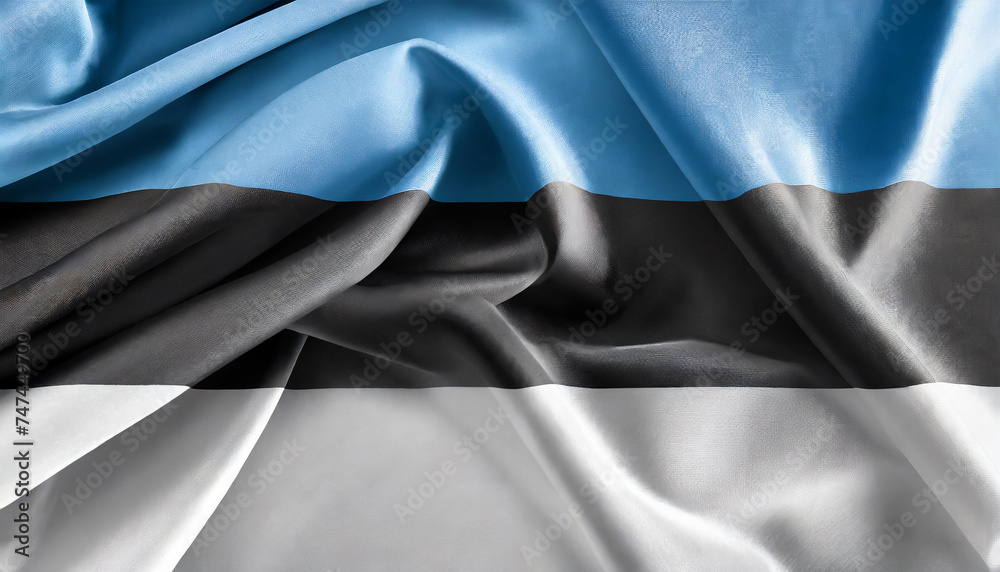 National Estonian silk fabric flag. Symbol of Estonia. Banner for celebrating Independence Day.