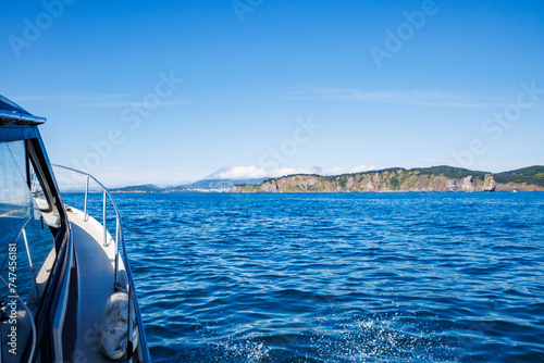 Landscape Petropavlovsk Kamchatsky yacht with sun light, deep sea fisher sport