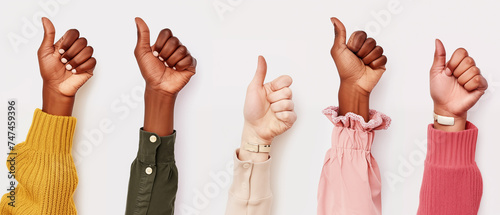 thumbs up on white plain background symbolizing success and achievment photo