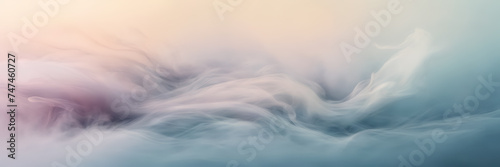 A close-up image of wispy, ethereal smoke billowing gracefully against a gradient of soft pastel hues.