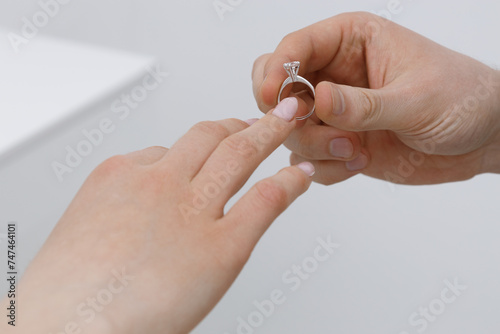 guy puts on the diamond ring of his trouble. Makes an offer. Marriage