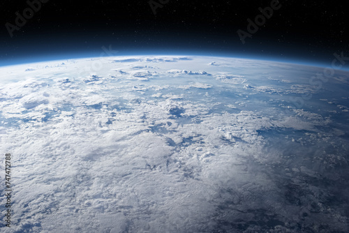 Cloudy Earth in space. The Earth surface is covered by clouds. Elements of this image furnished by NASA. photo