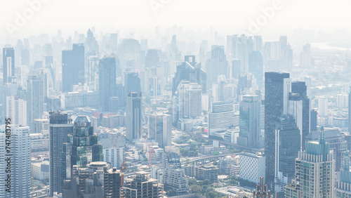An aerial view showing the city in Bangkok  Thailand in the morning. There is thick PM 2.5 dust covering the entire city. This is a picture that shows the problem of the changing environment.