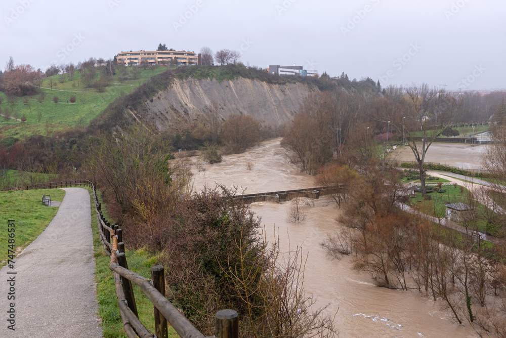River flood. Arga River as it passes through the Old Bridge of Burlada. Navarre