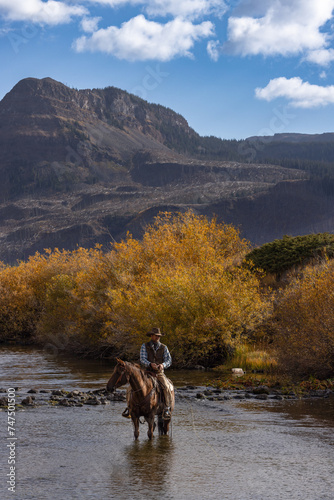 Colorado Cowboy Fly Fishing in the Mountains From Horseback © Terri Cage 