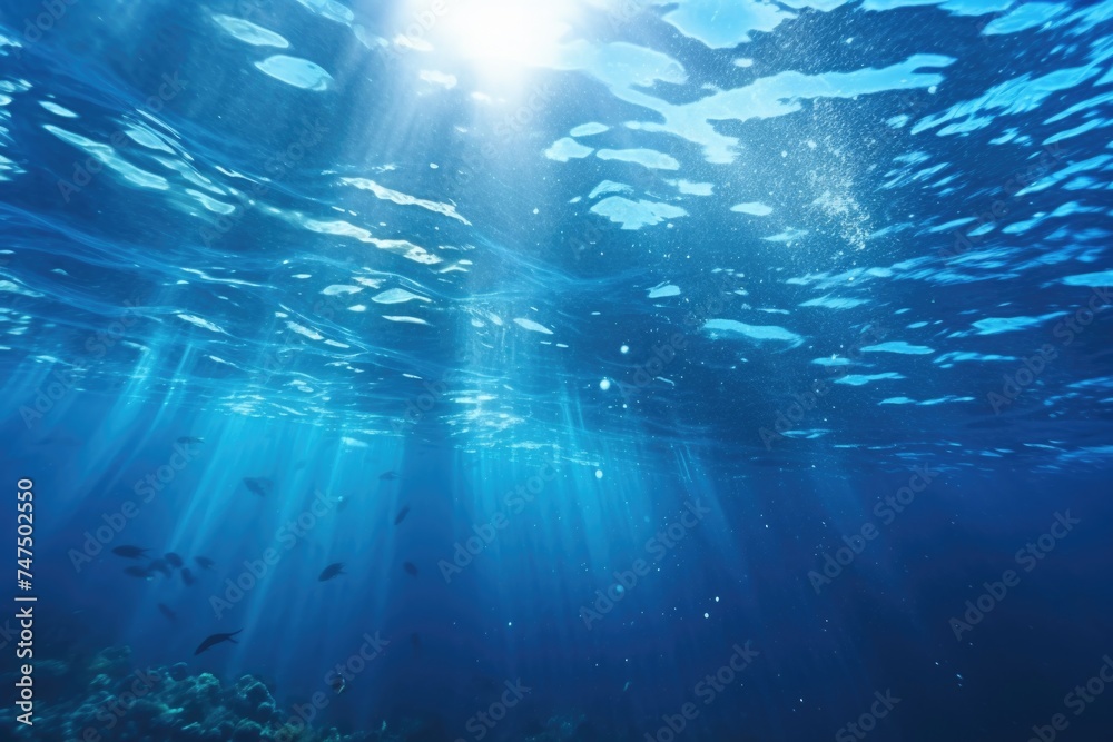 Sun shining brightly through the water's surface. Suitable for nature and underwater themes