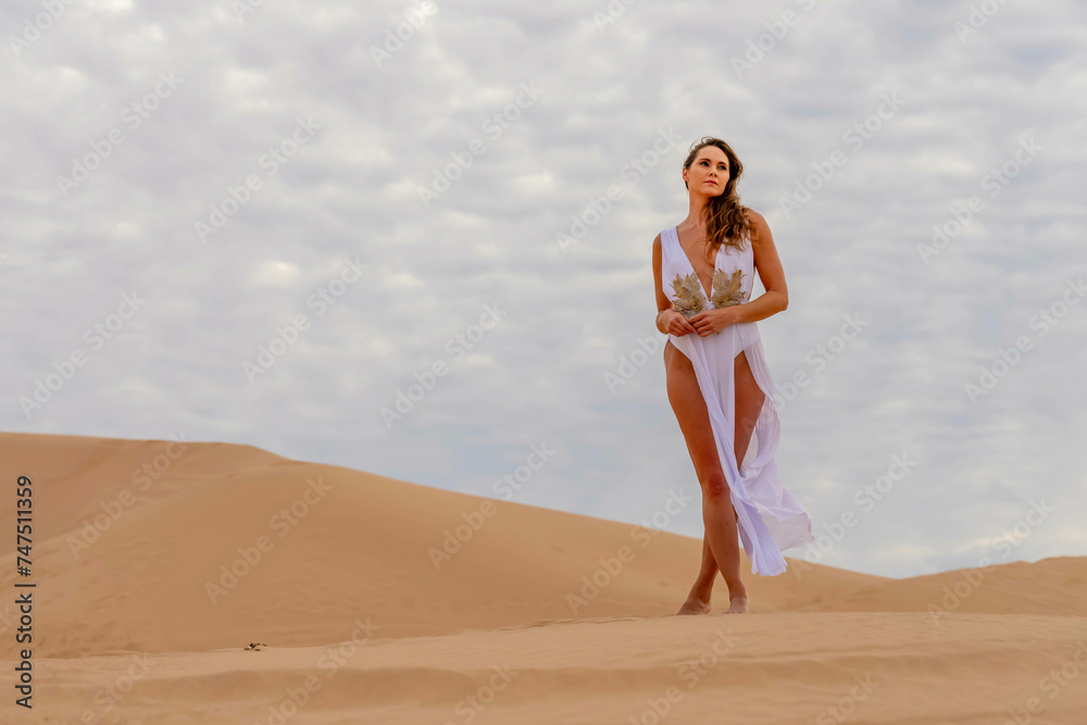 Sculpted by Nature: Model's Grace Amidst Imperial Sand Dunes, California's Timeless Beauty Captured in Mesmerizing Photoshoot Sculpted by Nature: Model's Grace Amidst Imperial Sand Dunes, California's Timeless Beauty Captured in Mesmerizing Photoshoot