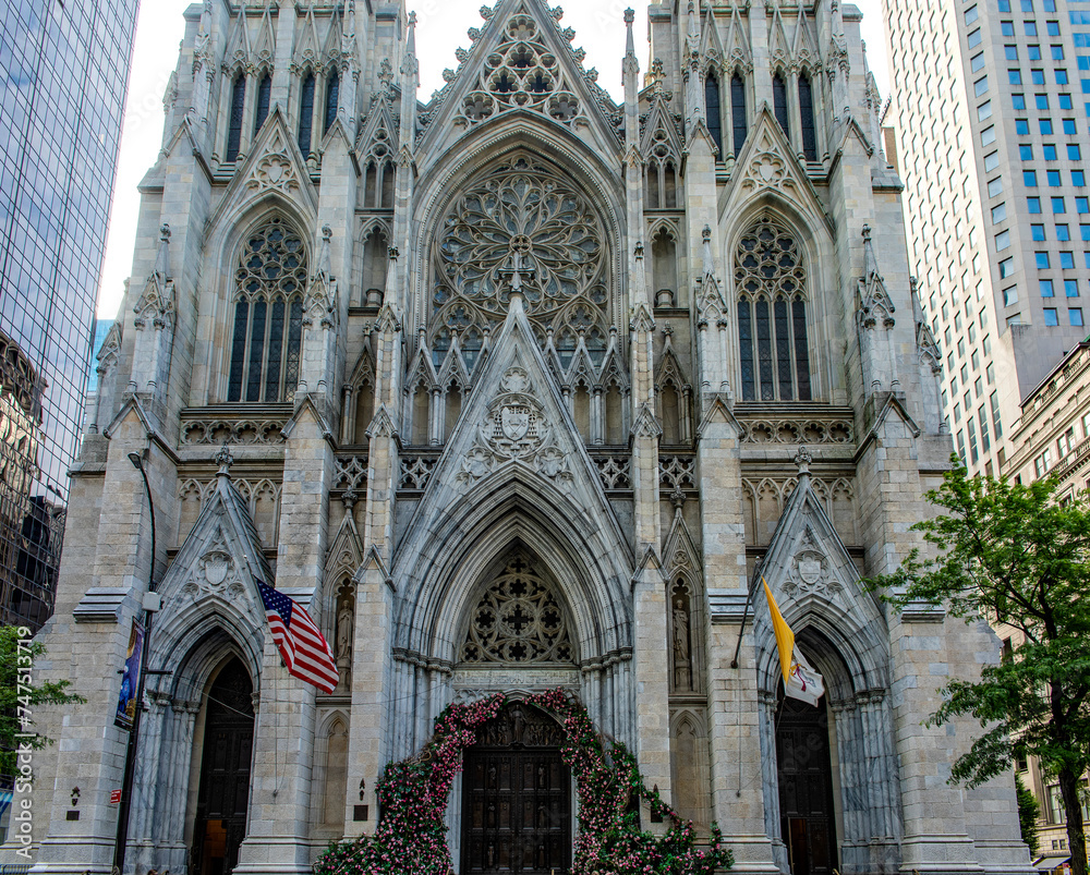 Facade of St. Patrick's catholic cathedral of neo-gothic style, located in midtown Manhattan on the 5th avenue of the Big Apple in the heart of New York (USA).