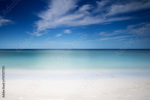 Fototapeta Naklejka Na Ścianę i Meble -  Symmetrical tropical white sand beach and calm sea background, calm