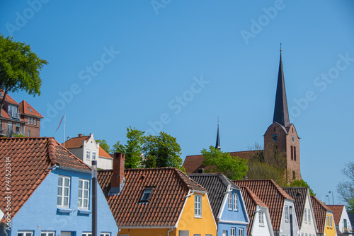 Colorful houses and the St. Marie church in the Danish city of Sønderborg