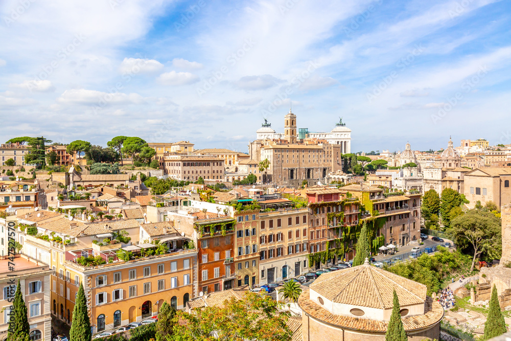 Panoramic cityscape view of the Rome city center and Roman Altar of the Fatherland in Rome, Italy. World famous landmarks in Italy during summer sunny day