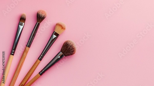 brushes on a wooden background.