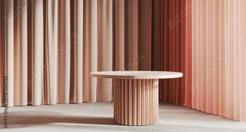 a round velvet table with a pink curtain in front