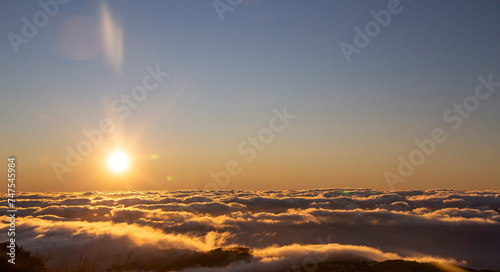 Over the clouds at sunrise
