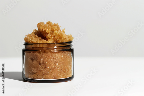brown sugar scrub on white background, empty copy space, minimalism, simple, advertisment