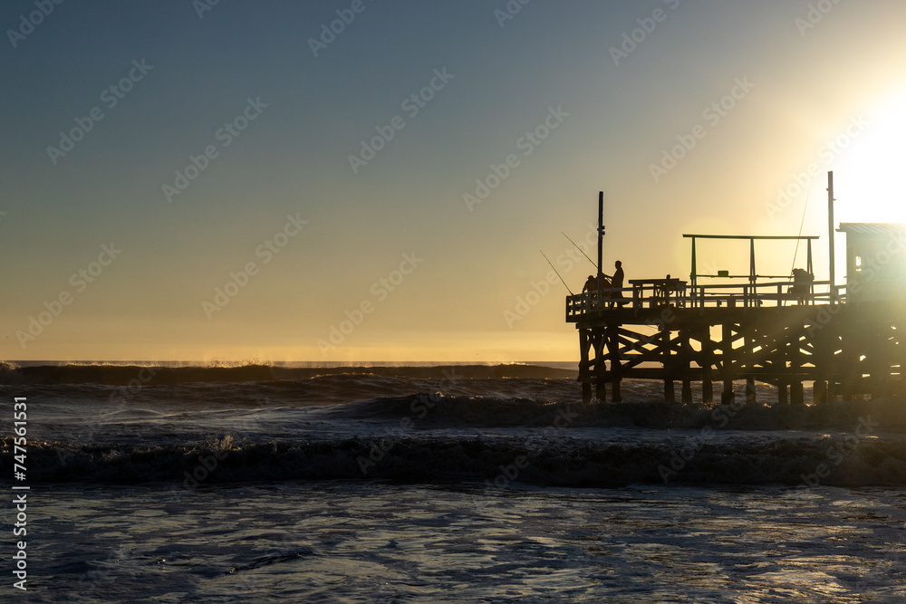 Sunrise on Argentina Beach with a view of the Dock