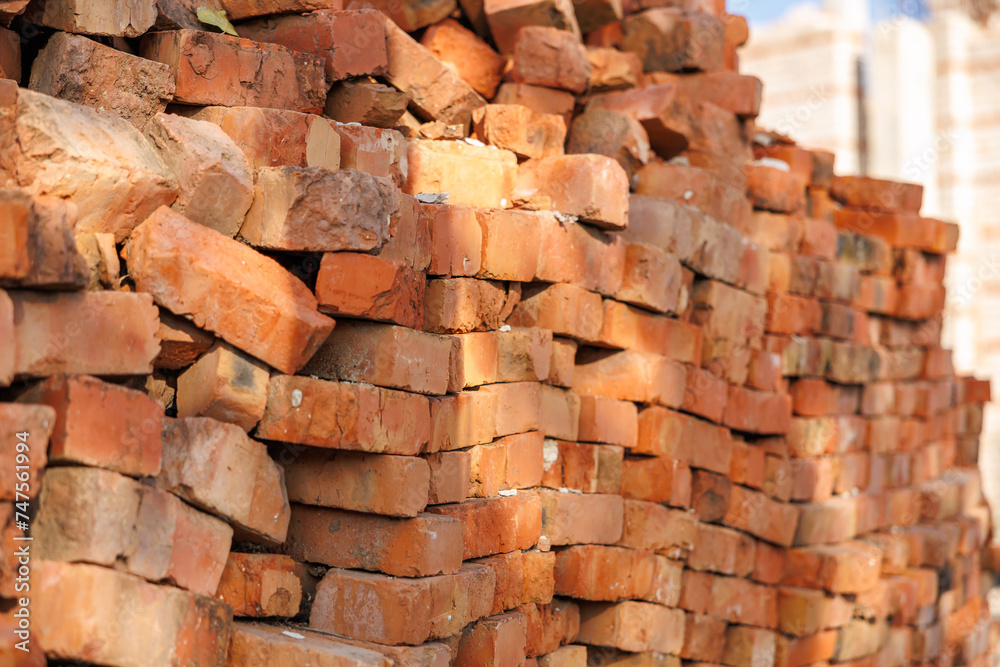 Red bricks. Background with selective focus and copy space Red bricks. Background with selective focus and copy space