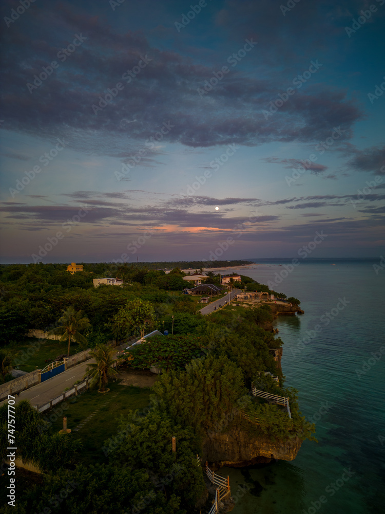Moonrise and Dusk Colors over the Cliffside of Bantayan Island, Philippines