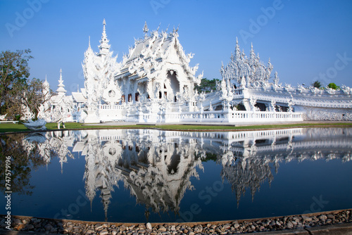 CHIANG RAI, THAILAND - FEBRUARY 2019: wat Rong Khun The famous White Temple in Chiang Rai, Thailand photo