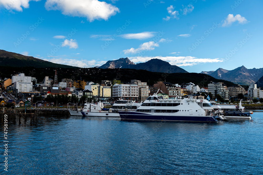 landscape of the port of Tierra del Fuego Ushuaia end of the world with its ships on the Beagle Channel with its mountains in the background landscape of the port of Tierra del Fuego Ushuaia end of the world with its ships on the Beagle Channel with its mountains in the background