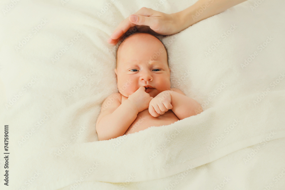 Portrait of infant sweet sleeping lying on white bed at home Portrait of infant sweet sleeping lying on white bed at home