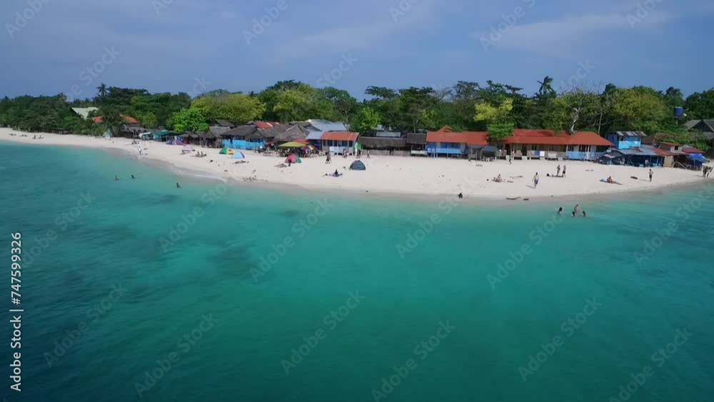 White Beach in Moalboal, Cebu, Philippines. Beautiful Landscape with Seashore and People in Background. Drone White Beach in Moalboal, Cebu, Philippines. Beautiful Landscape with Seashore and People in Background. Drone