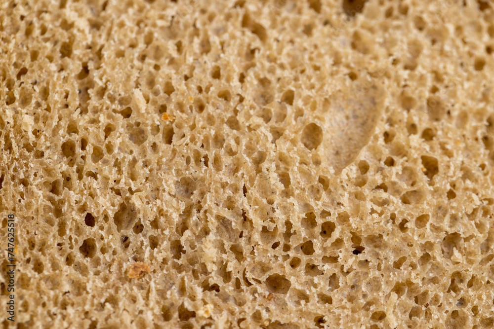 a loaf of dark rye sour bread in the kitchen