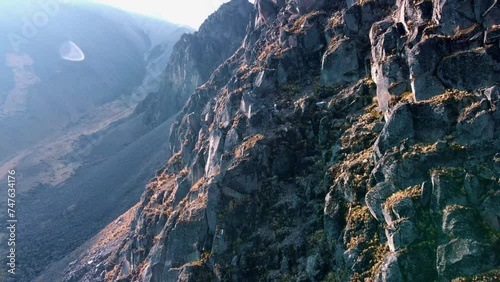 flying over the rocks of a volcano photo