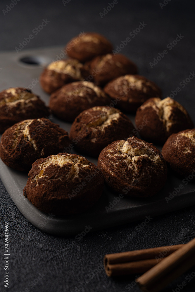 Cinnamon crinkle cookies on a black background Cinnamon crinkle cookies on a black background