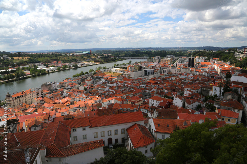 Panoramic view of the cityscape Coimbra and the River Mondego, Portugal.