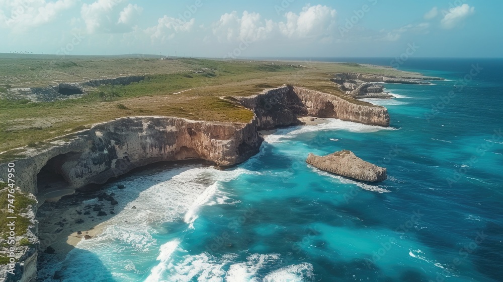 Obraz premium Drone Capture of Wild Coastline: Inaccessible Coves and Beaches with Crashing Waves