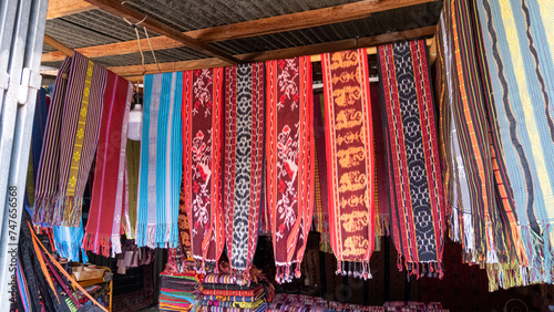 A selection of traditional cultural colorful woven tais scarfs at market in Timor-Leste, Southeast Asia