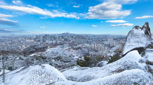 Seoul City in winter with snow and Seoul Tower South Korea