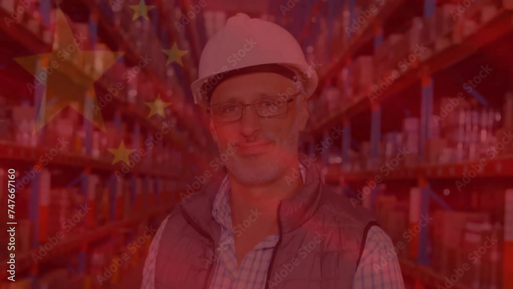 Animation of flag of china over senior caucasian worker smiling in warehouse