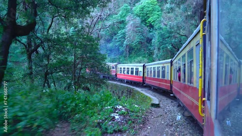 Toy Train Shimla after snowfall Historic train on the way to the Shimla, UNESCO World Heritage Site, Himachal Pradesh, India. photo