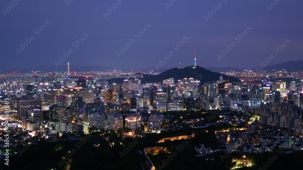 Evening cityscape seen from Inwangsan Mountain in Seoul, South Korea Evening cityscape seen from Inwangsan Mountain in Seoul, South Korea
