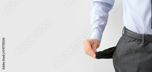 Businessman with empty pock...